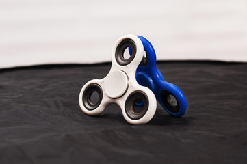 Two spinners on black and white background