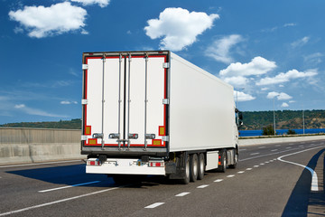 Trucks with cargo on highway, shipping and transportation concept