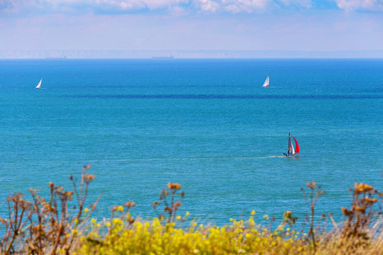 Yachts seen in Dover Strait (English Channel or La Manche) in Escalles, Cap Blanc-Nez, Nord-Pas-de-Calais, France