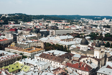 Fototapeta na wymiar A view from above on the historical center of Lviv. The roofs of the old city..Roofs of Lviv, Ukraine