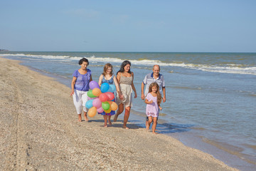 Happy family. Grandmother, grandfather, Mother, youngest daughter and an seventeen-year-old daughter with Down syndrome.