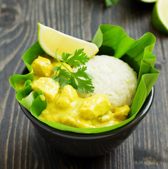 Yellow curry with chicken and rice. Asian cuisine.