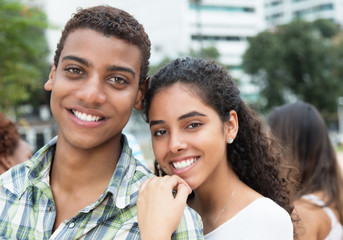 Beautiful indian couple looking at camera