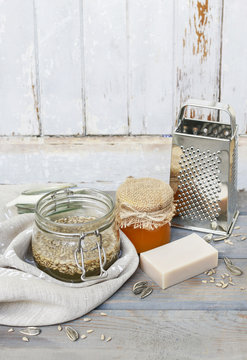 Jar of sunflower seeds, honey and bar of handmade soap