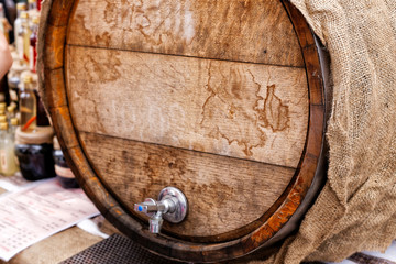 Local Food Festival. Wooden barrel with wine