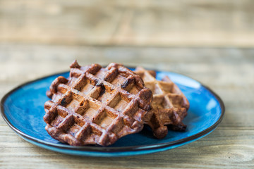 Chocolate Belgium Waffles on Dark Rustic Background
