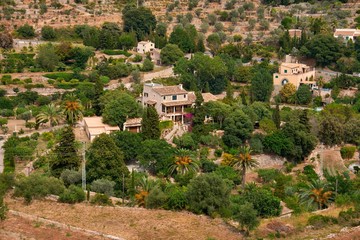 Fototapeta na wymiar Mediterranean village in the Tramuntana mountains, view of Valldemossa, beautiful landscape of Majorca island Spain