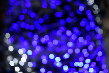Defocused fireworks and bokeh at New Year and copy space. Christmas abstract template