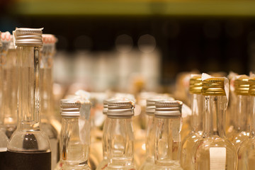 miniature alcohol bottles in store