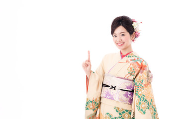 Fototapeta premium portrait of young asian woman wearing traditional kimono isolated on white background