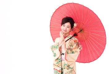 Fototapeta premium portrait of young asian woman wearing traditional kimono isolated on white background
