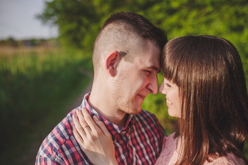 Fototapeta premium young couple in love together on nature