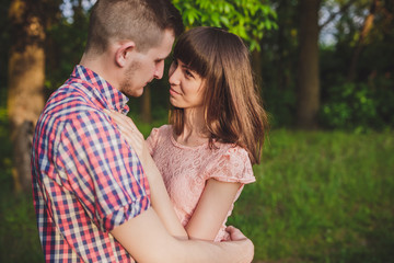 Fototapeta premium Happy couple on vacation. Lovers are laughing. Happy guy and girl.