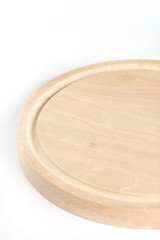 Round kitchen cutting wooden board on the white background