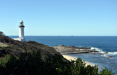 Fototapeta na wymiar Norah Head Light is an active lighthouse located at Norah Head, a headland on the Central Coast, New South Wales, Australia.