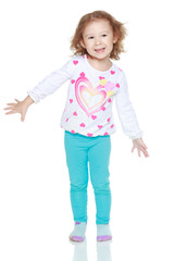 Cute little blonde girl in the studio.