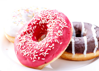 Delicious donuts with sprinkles