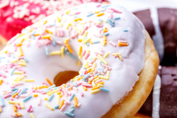 Delicious donuts with sprinkles