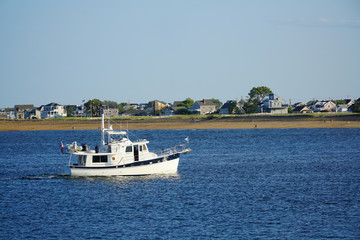 Fototapeta na wymiar fishing boat in the sea harbor