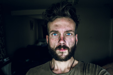 Mans dirty hard working face.
