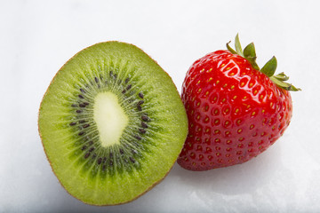 Closeup of strawberries and sliced kiwi fruits