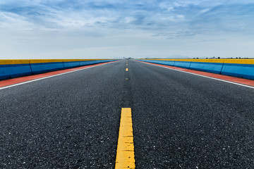 Empty road and the traffic lines.