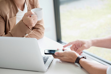 Attractive meeting at nonprofit boardroom group of employees at conference table workers collaborate in discussion