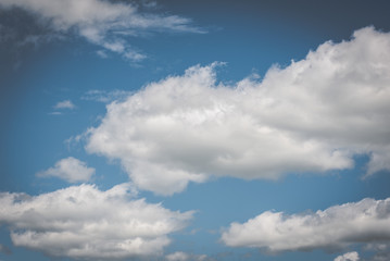 Fototapeta na wymiar White Clouds and Blue Sky Background