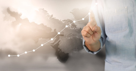  Businessman plan growth and increase of chart positive indicators in his business