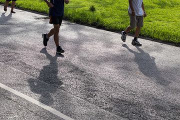 Shadow people running on the street.