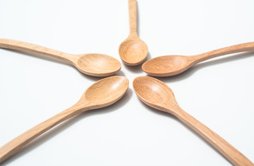 Wooden spoon isolated on white background