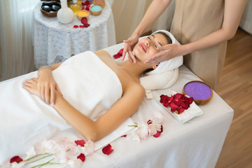 Obraz na płótnie Canvas Traditional oriental massage therapy and beauty treatments. Young beautiful have massage woman in spa salon.