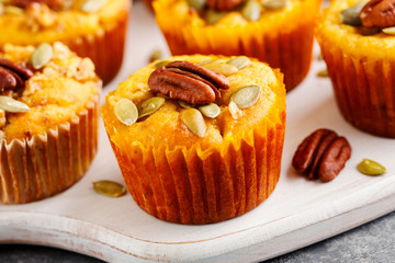 Homemade muffins of pumpkin with pecans. Close up