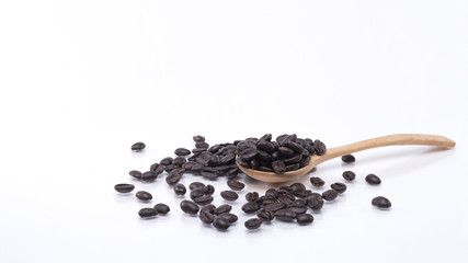 Fototapeta na wymiar Coffee beans are in a wooden spoon, white background.