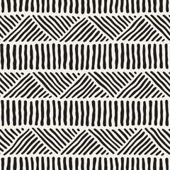 Hand drawn style ethnic seamless pattern. Abstract geometric tiling background in black and white.