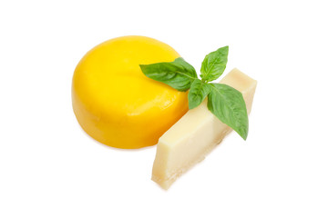 Parmesan cheese and small wheel of firm goat cheese