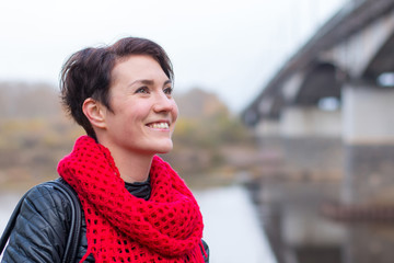 Nice girl in red scarf outdoor