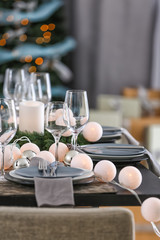 Table served for Christmas dinner in living room