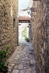 Fototapeta na wymiar Old narrow street in Ulcinj.