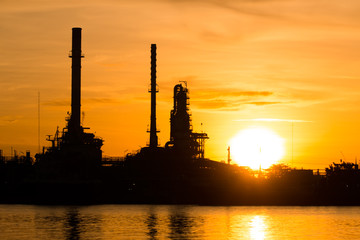 Fototapeta premium Petrochemical industrial plant power station at sunset and ,view,Amata City Industrial Thailand.