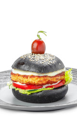 Black burger isolated on white background.