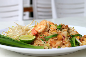 Thai food Pad Thai ,Stir fry noodles with shrimp in white plate. The one of Thailand's national main dish. the popular food in Thailand. Thai Fried Noodles.