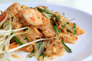Thai food Pad Thai ,Stir fry noodles with shrimp in white plate. The one of Thailand's national main dish. the popular food in Thailand. Thai Fried Noodles.