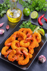 deep fried breaded shrimps on plate