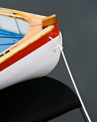 Fototapeta na wymiar Row boat bow on dark water