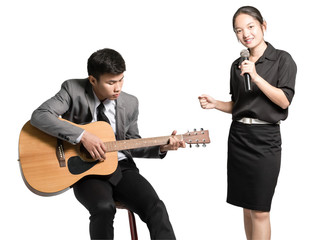 Portrait of a young business man with guitar and business woman with microphone. Office party concept. Isolated on white background with clipping path