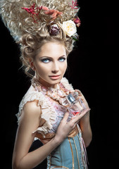 Young woman with beautiful hairstyle and perfume