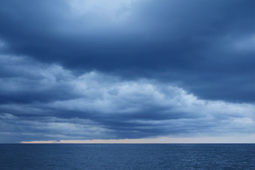 Fototapeta na wymiar Rain storms are happening at sea