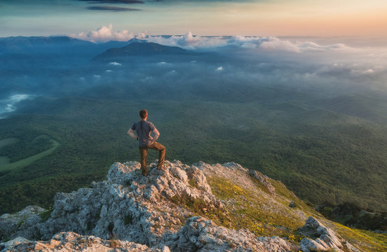 Man standing on a rocky mountain top