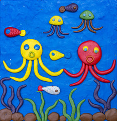 Naklejka na ściany i meble Colorful clay underwater world make by children